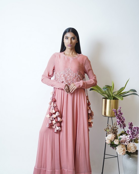 Rose Pink Anarkali with churidar sleeves, paired with a short jacket and heavy tassels on either side (SDH1012) Rose Pink Anarkali with churidar sleeves, paired with a short jacket and heavy tassels on either side (SDH1012)