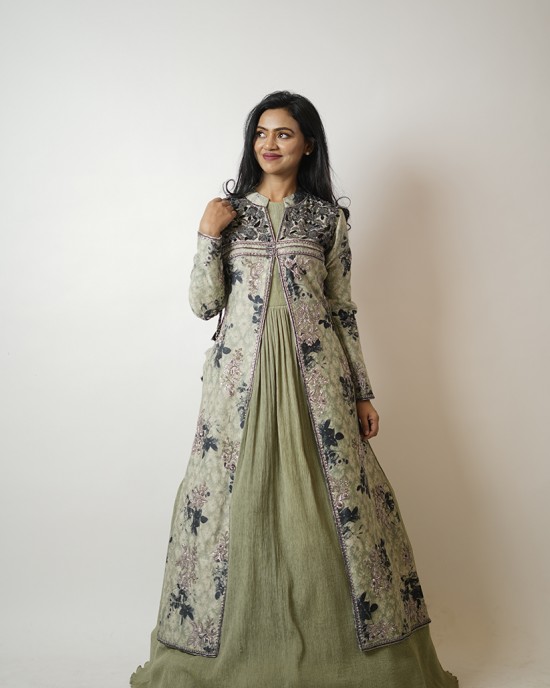Light Green Gown paired with a long jacket with heavy tassels on either side (SDH1017)