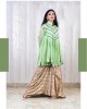 Tie-up Skirt paired with a Mint Green gathered peplum top and has chudidar sleeves(TZ1006)