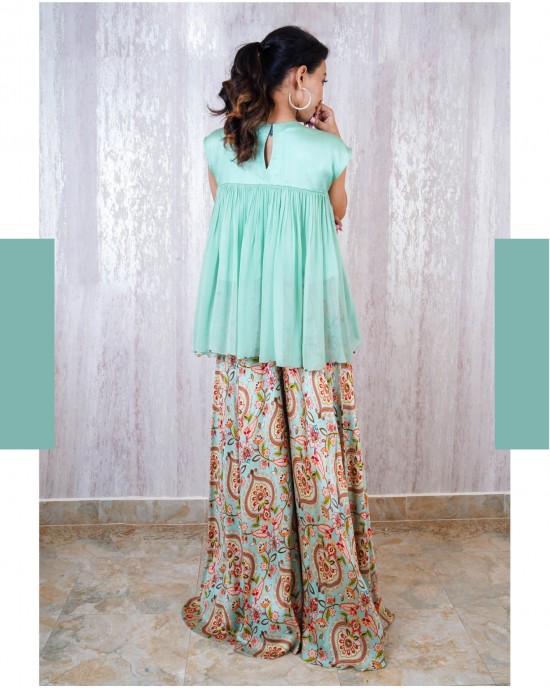 Light Blue Peplum top with gathers paired with a flaired pallazo (TZ1003)